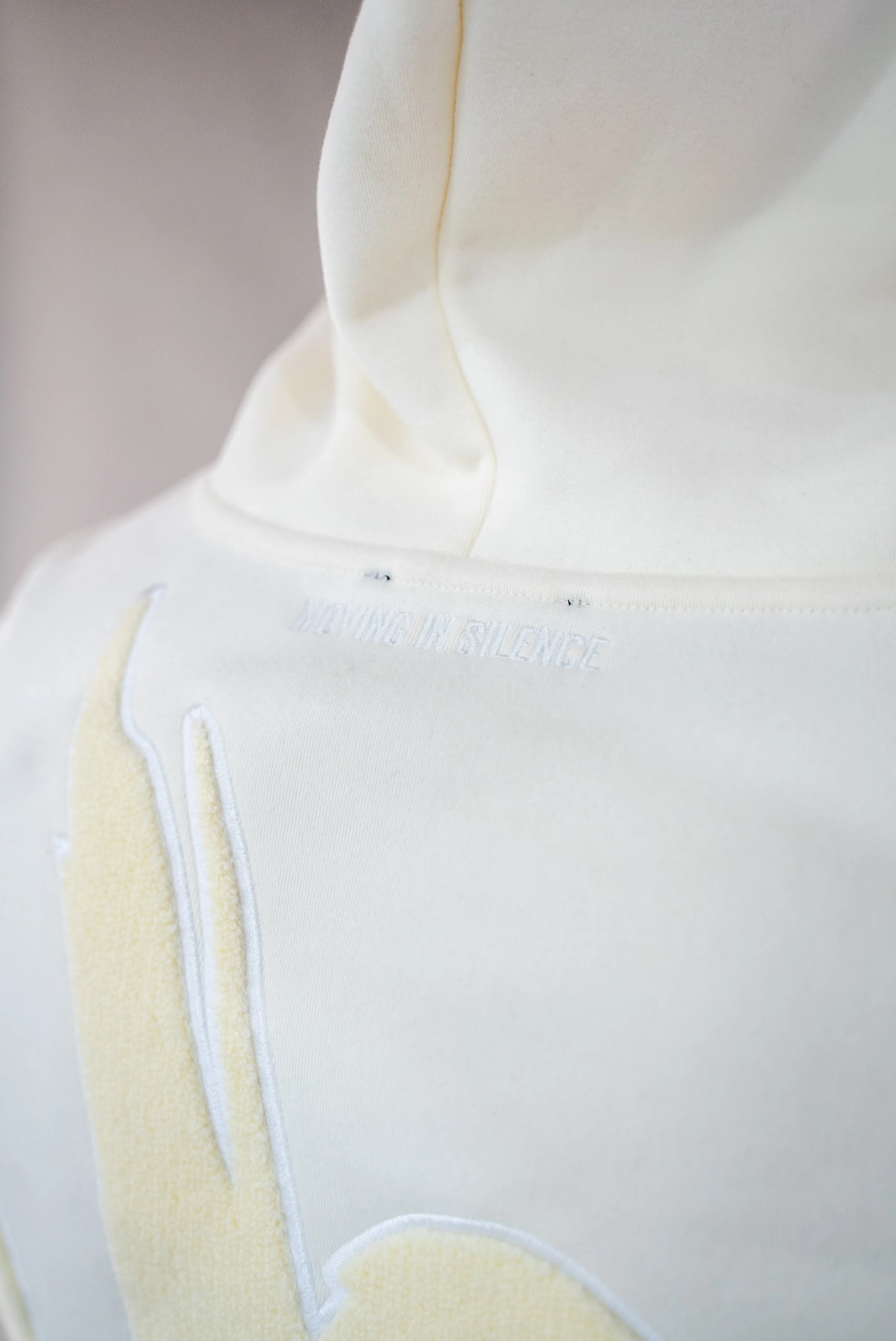 Cream/Off White Hoodie " Moving In Silence " Collection